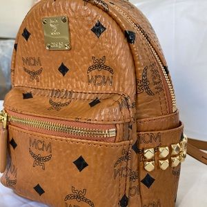 MCM mini stark backpack ** authentic only has one strap. Mint condition